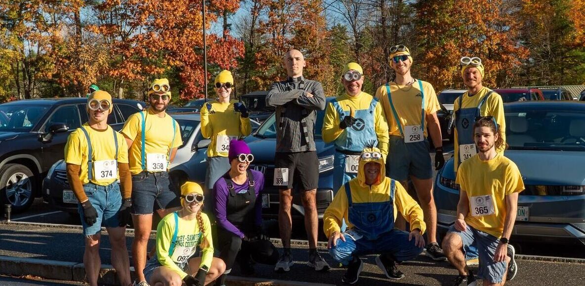 Pumpkin Dash 5K group photo with runners in costume